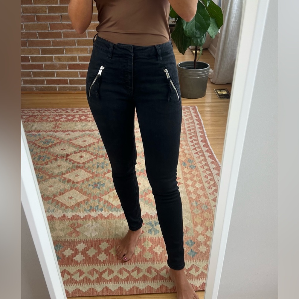 Prada distressed black skinny jeans. True to size, fits like a small.
